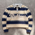 Striped sweater with 'Righteous' text on a textured surface