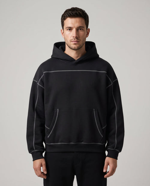 Righteous Contrast-Stitched Boxy Fleece Hoodie in black, front view on a model