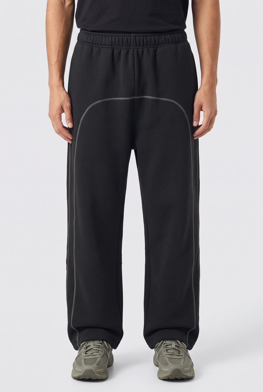 Righteous Contrast-Stitched Fleece Sweatpants in black, worn, front view of the legs