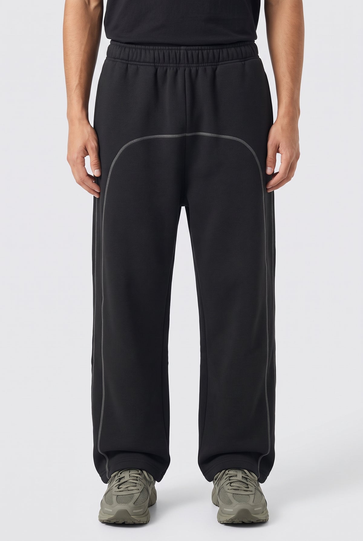 Righteous Contrast-Stitched Fleece Sweatpants in black, worn, front view of the legs